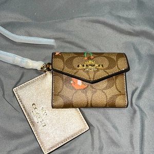 Coach mini card wallet in party animals pattern